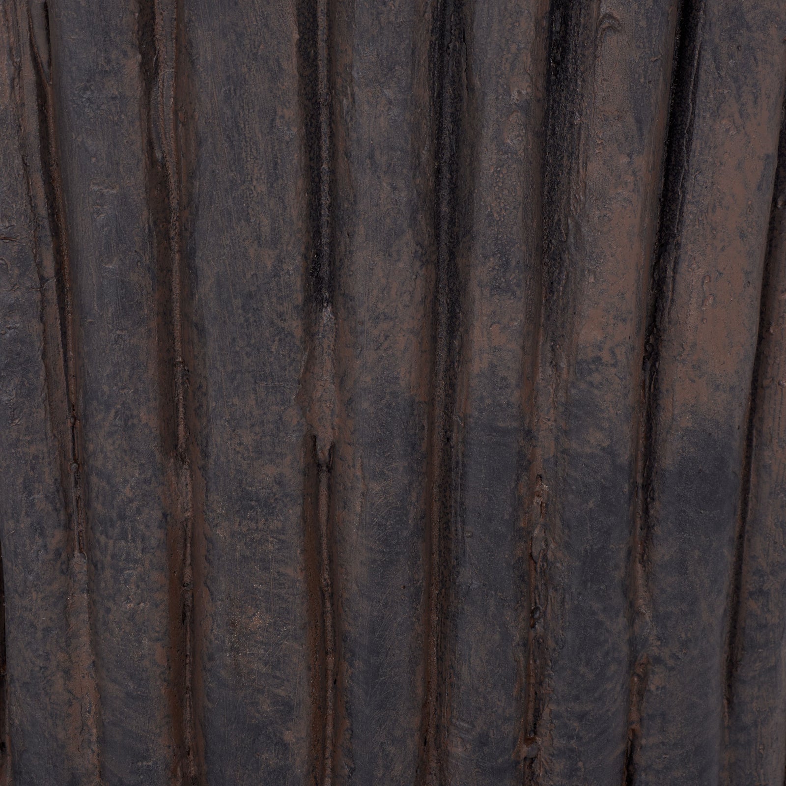 Warm brown tones settle into the deep grooves of the planter's textured surface || PAT5047B || swatch_studio