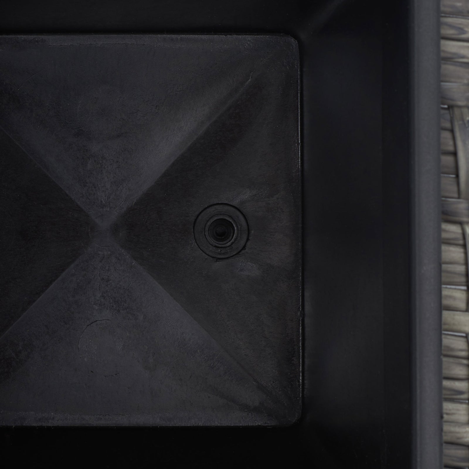 The black planting insert has a molded base with a small drain opening. || PAT7705C || detail_studio