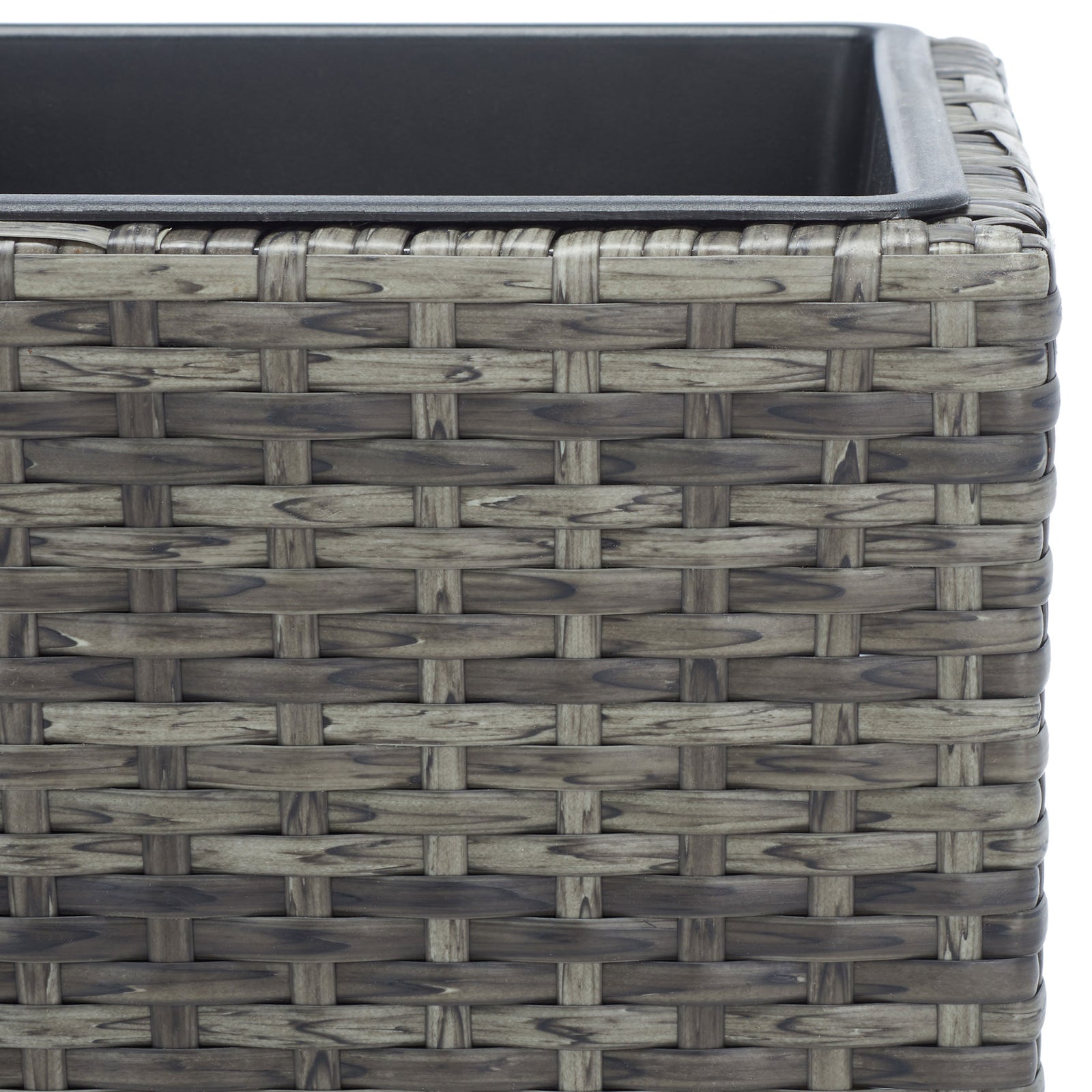 Variegated gray-brown wicker meets a smooth black planter rim. || PAT7705C || detail_studio