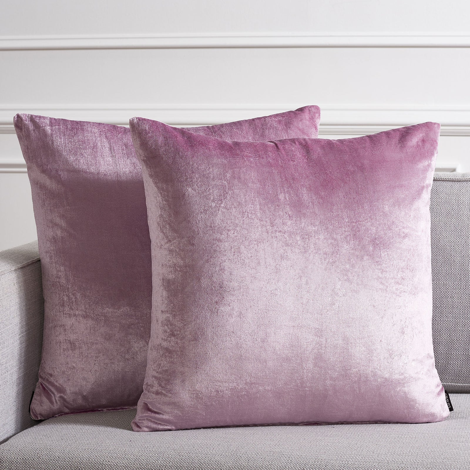 Two generously sized lavender pillows brighten a neutral sofa with soft lilac color. || PLS500D-2222-SET2 || front_multi_room