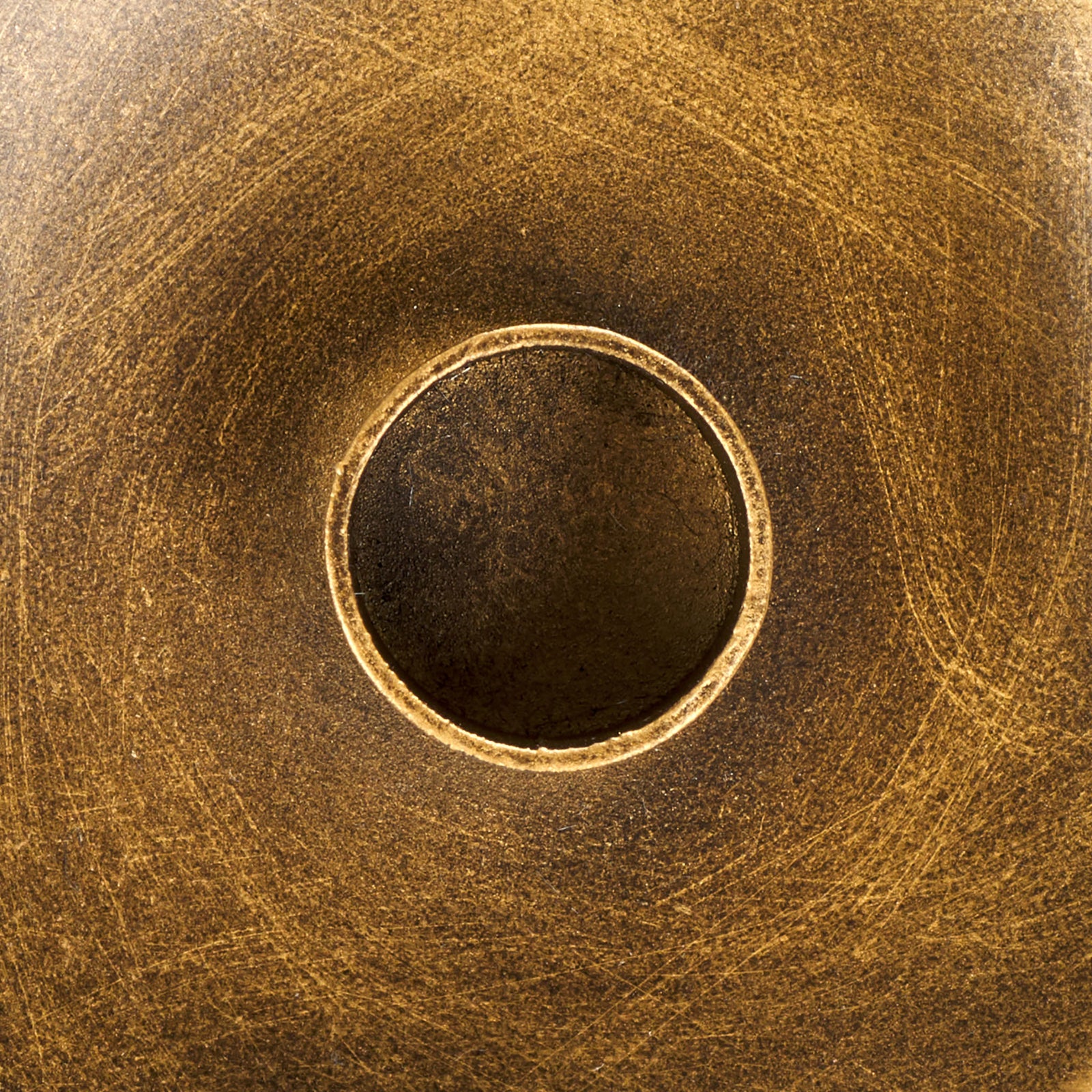 Fine aged markings enrich the warm brass-toned metal surrounding a round taper socket || RDC2501A || swatch_studio