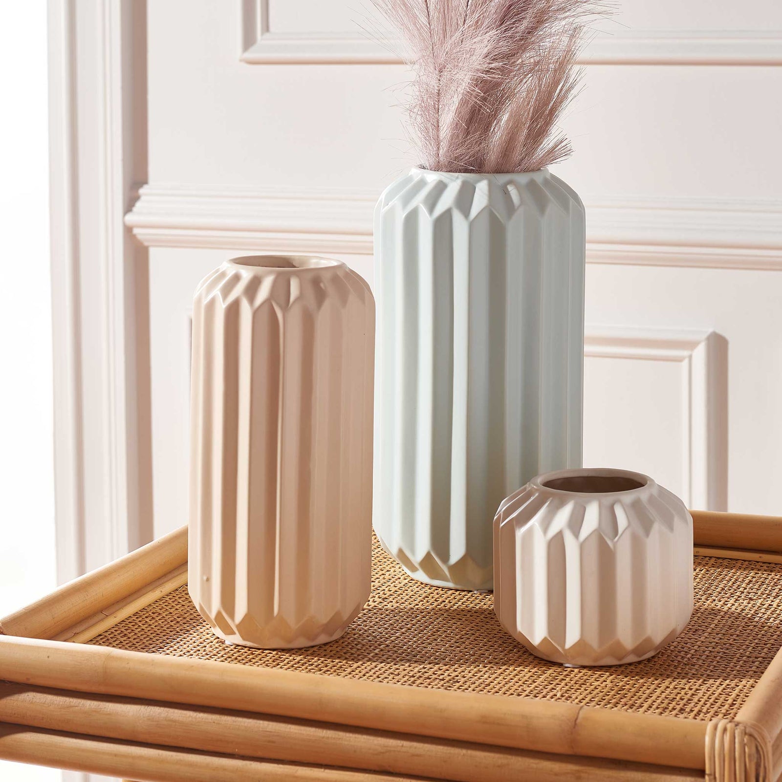 Trio of faceted ceramic vases in soft blue, blush, and white for a modern, sculptural accent. || RDC4013B-SET3 || front_room