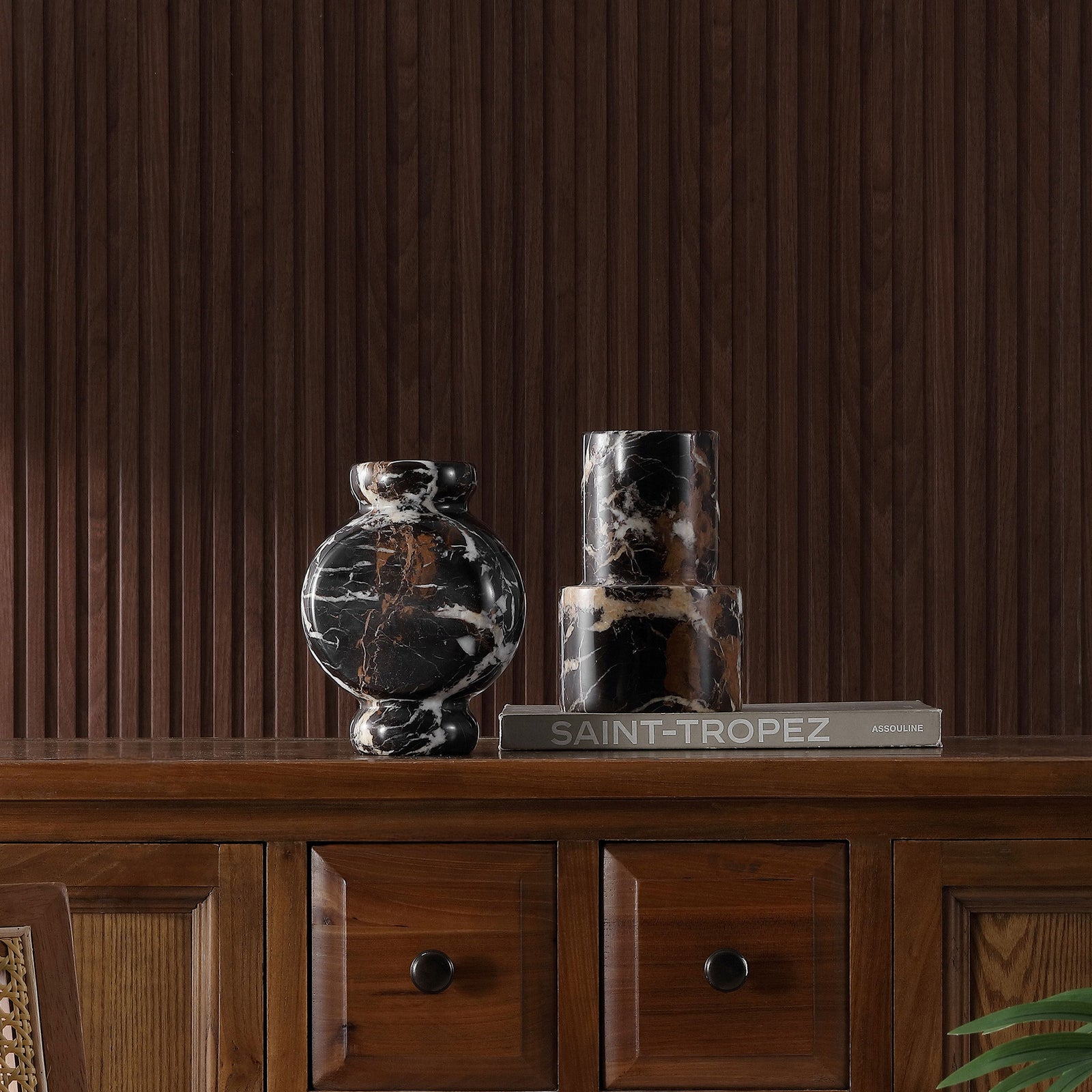 A rounded vase and a tiered cylinder pair contrasting forms with dramatic white and brown marble veining || RDC4024A-SET2 || front_room