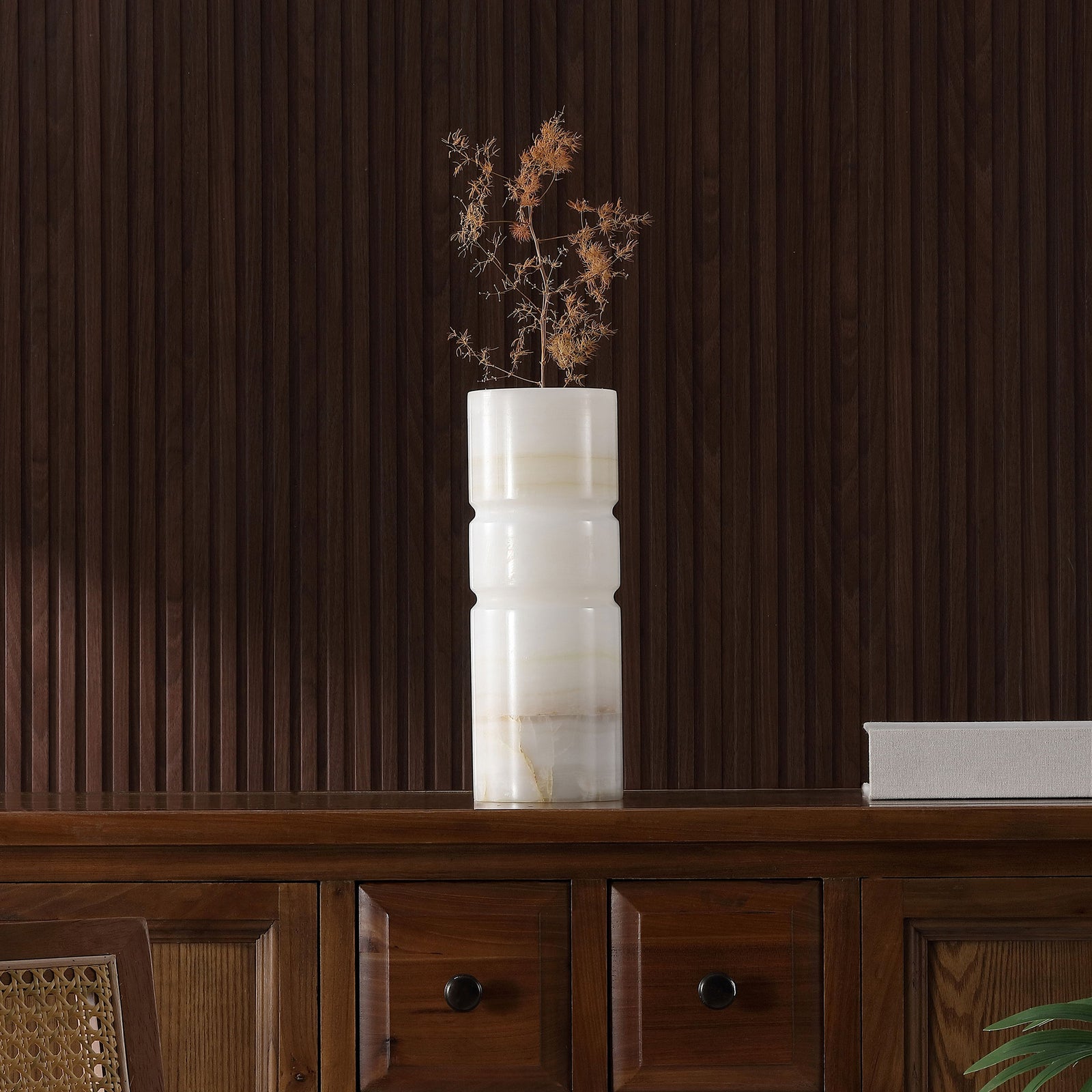 A banded ivory vase brings natural warmth and quiet texture to a display of dried stems || RDC4026A || front_room