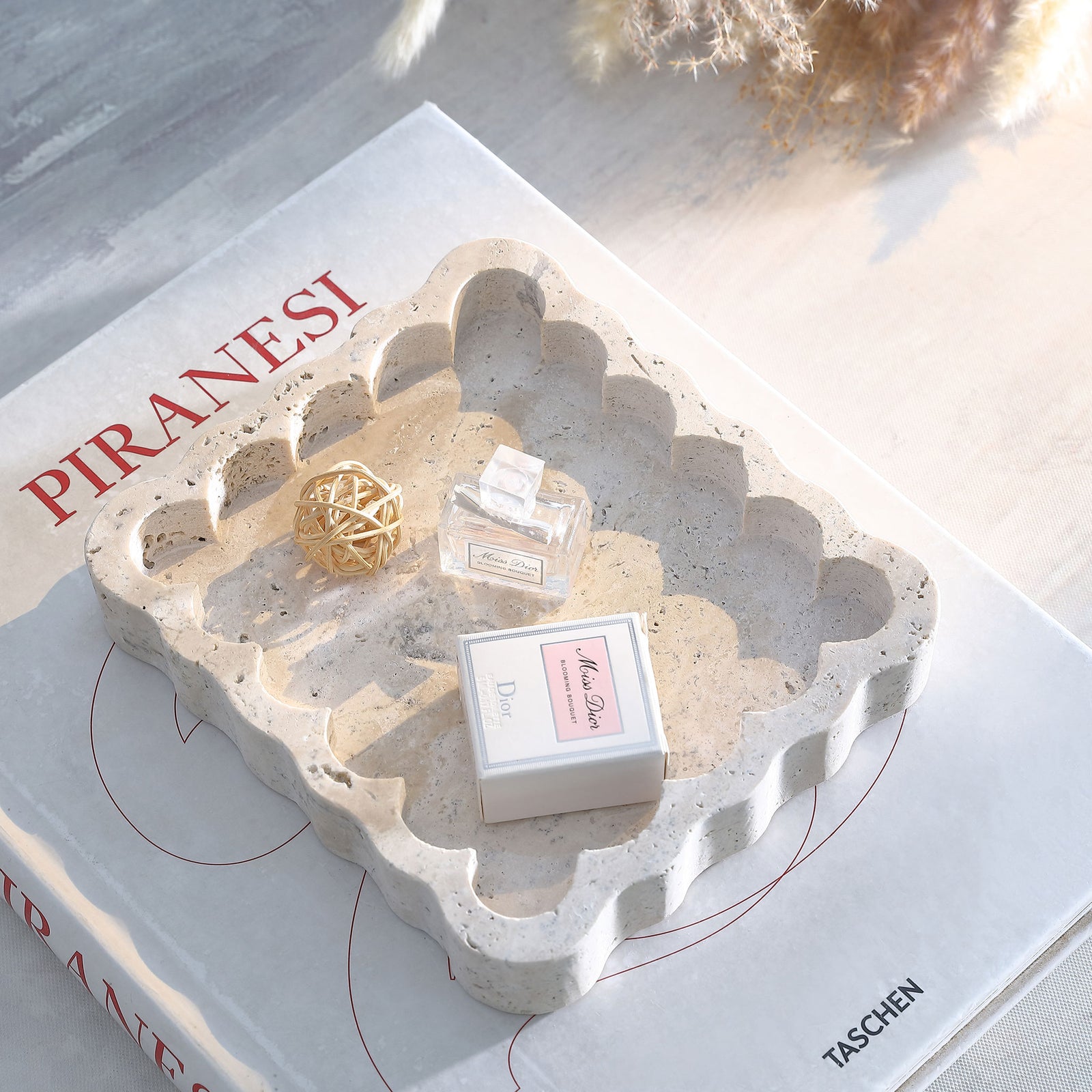 A scalloped marble catchall keeps perfume and small treasures stylishly organized. || RDC4053A || front_angle_room
