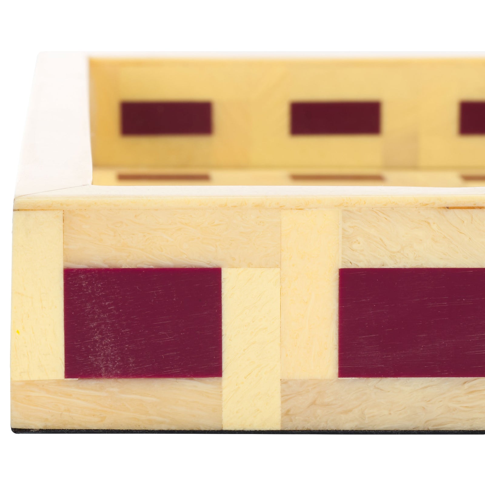 A pale yellow inner rim echoes the burgundy inlays on the tray's thick outer edge || RDC5012A || detail_studio