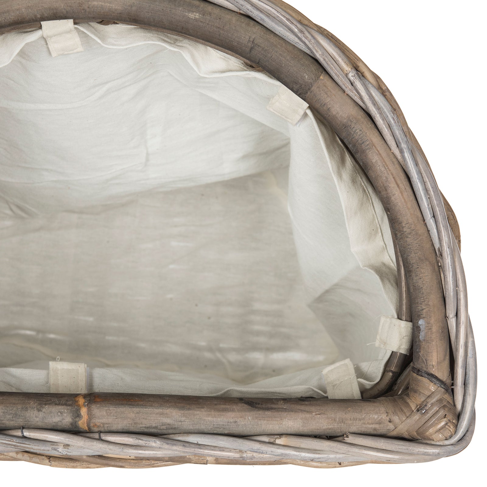 White cotton lining with fastening tabs softens the inside of this gray woven rattan hamper. || SEA7008A || storage_open_studio