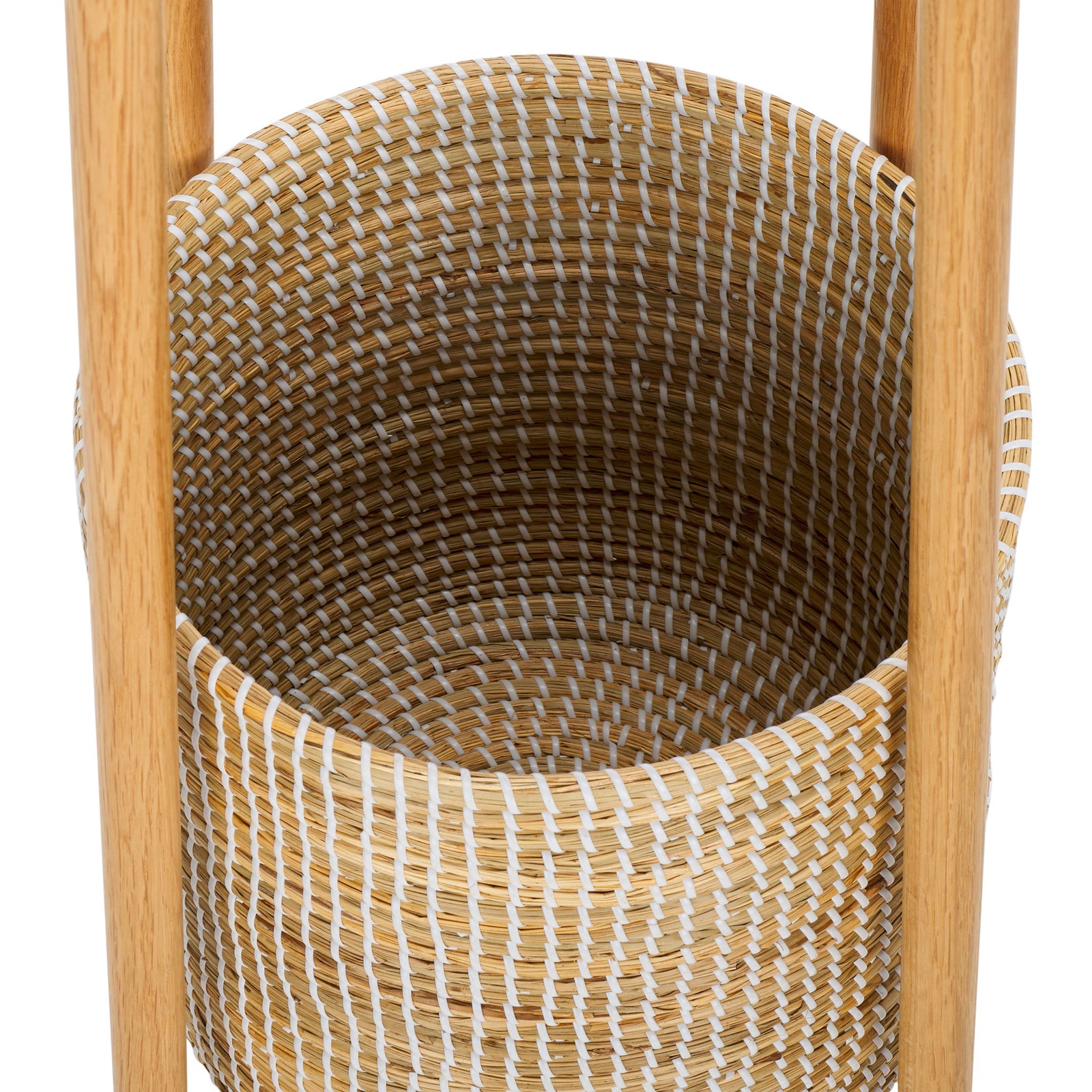 A woven basket with white accents offers storage between natural wood supports. || SFV4202A || storage_studio