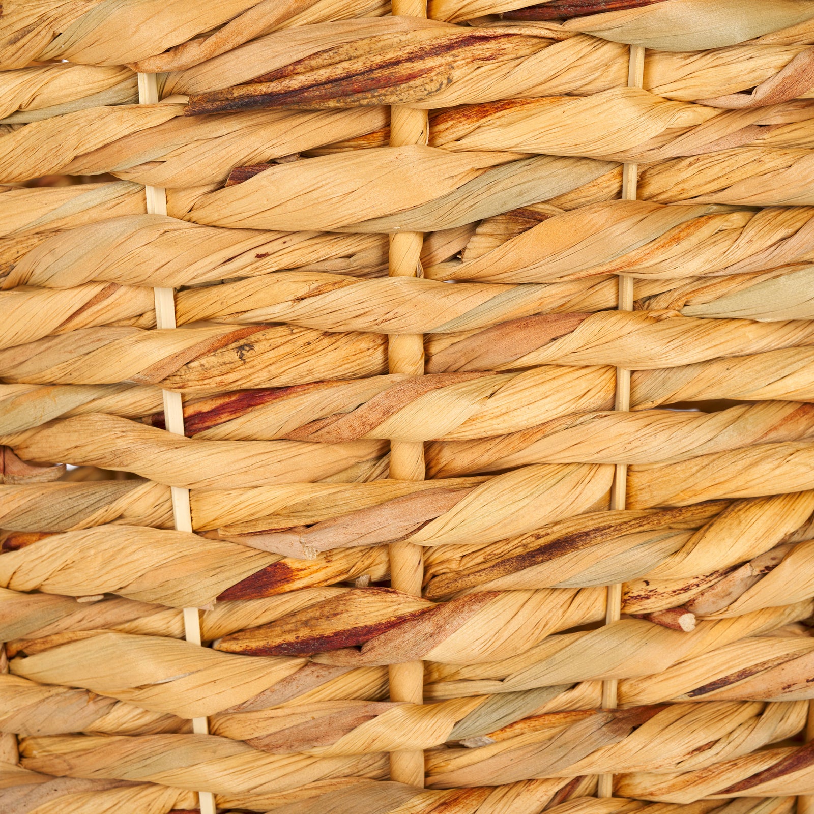 Golden and honey-toned water hyacinth strands add depth to the basket's woven texture. || STG1807A || swatch_studio