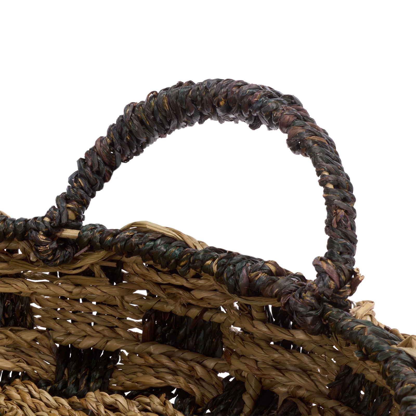 A dark seagrass loop handle arches above the shallow basket's open-weave walls || STG1825A-SET2 || handle_studio