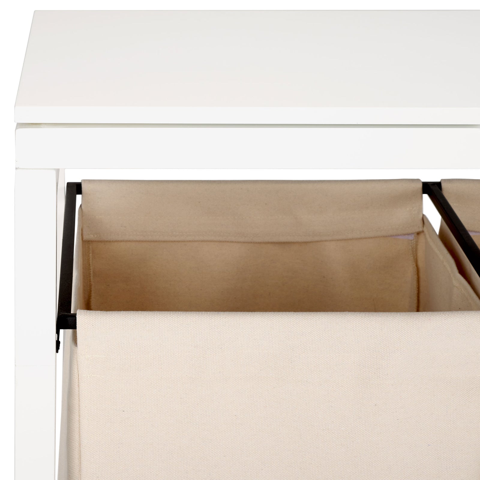 A roomy beige fabric compartment hangs from black rails beneath the smooth white lid. || STG1900A || storage_studio