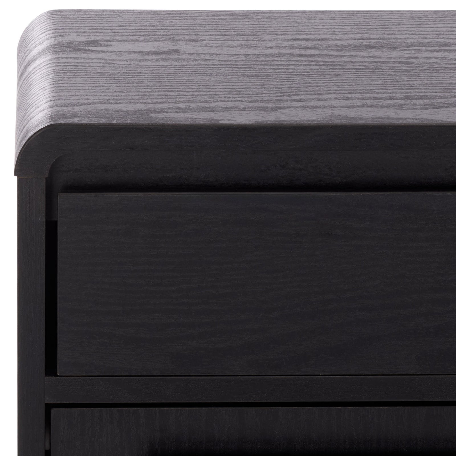 Gently rounded corners and subtle wood grain soften the cabinet's sleek black top. || STG3100B || detail_studio