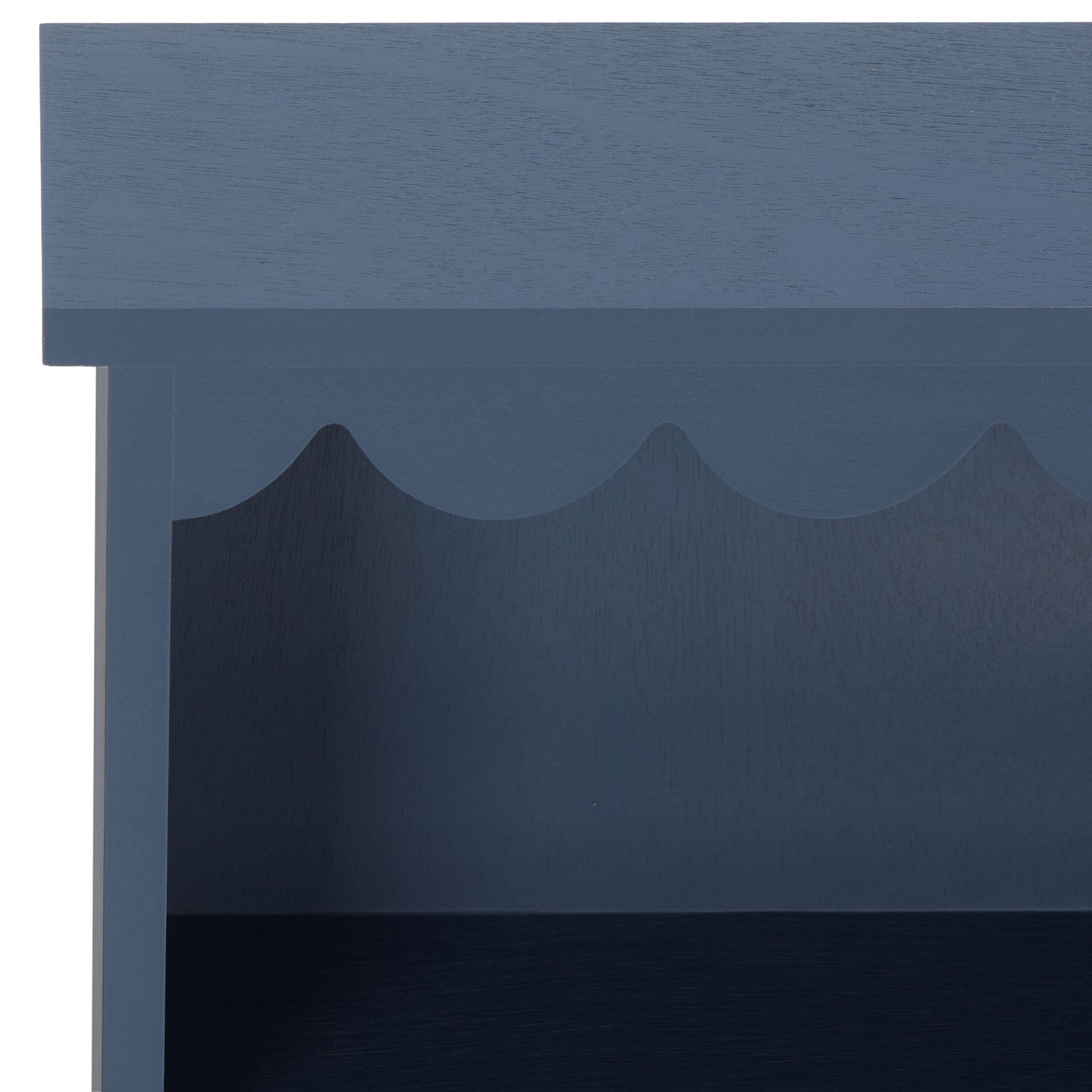 Scalloped trim adds a decorative touch to the top of the deep blue wood rack || STG5702D || detail_studio
