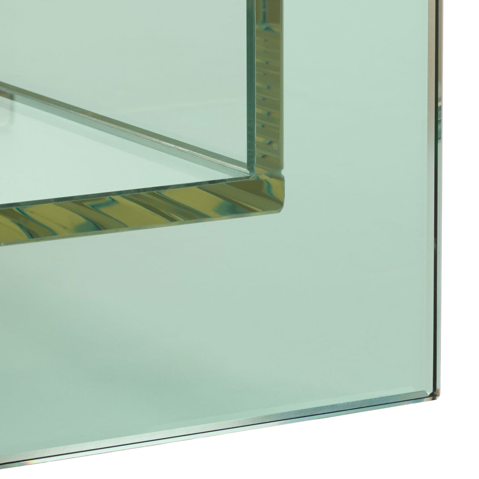 Green glass supports the clear shelf with a thick, polished edge || STG7301A || leg_studio