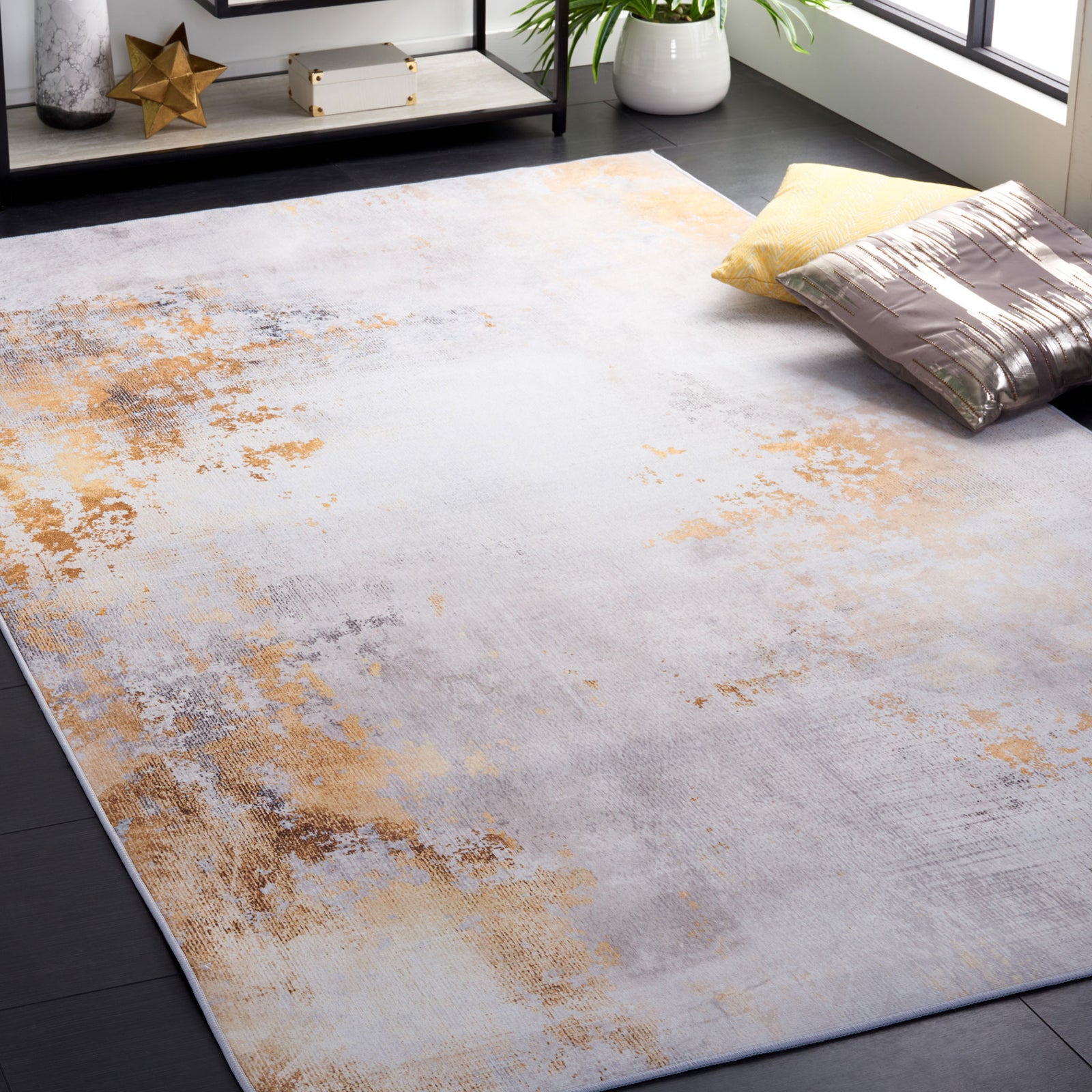 Abstract gray and gold rug adds modern warmth to a sunlit living space || TAC805F-5 || top_room