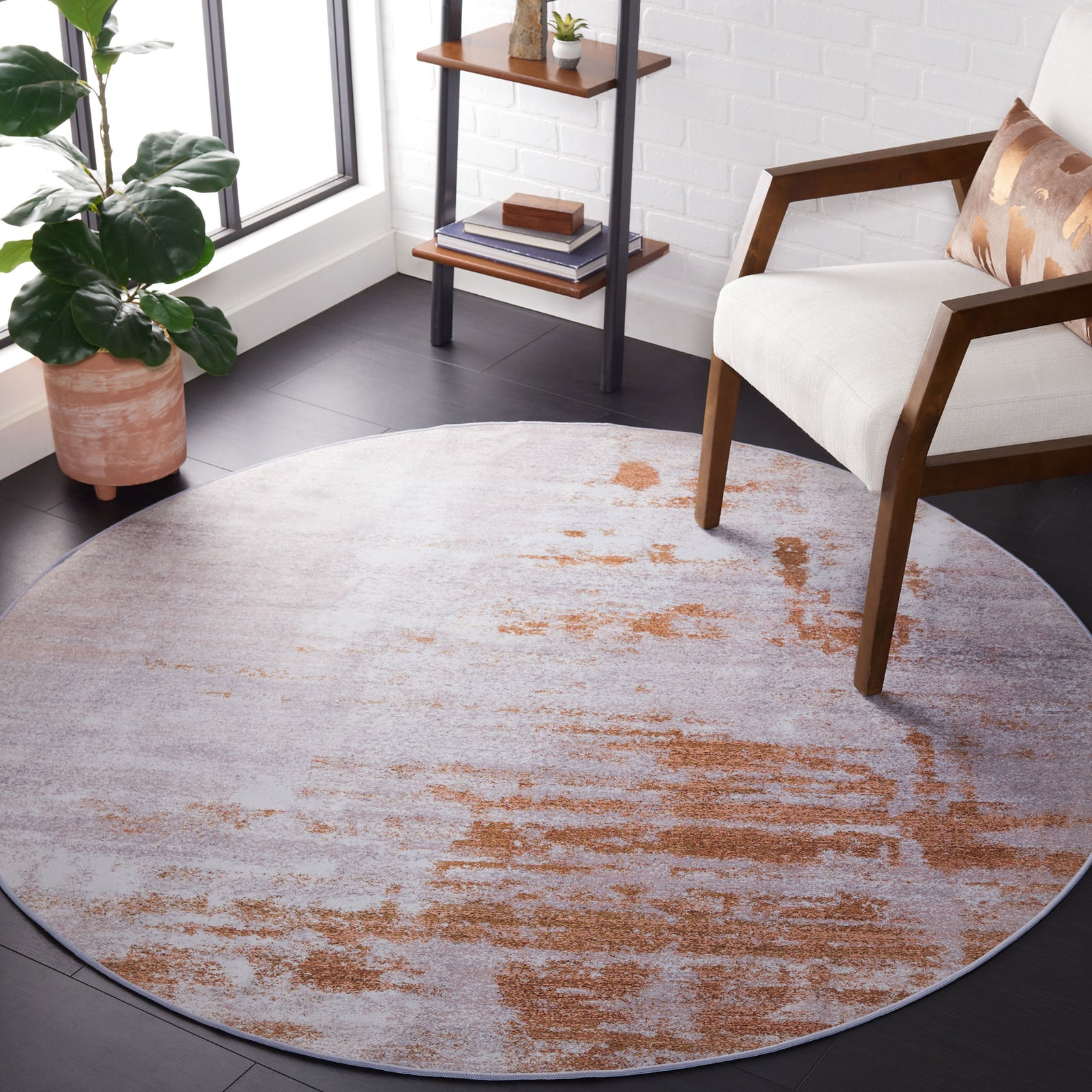 Abstract gray and rust round rug brings warm, washable style and steady, slip-resistant footing to your space. || TAC808P-6R || top_room