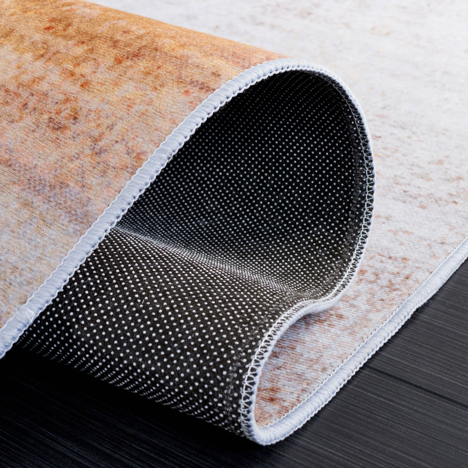 Slip-resistant dotted backing ensures stability on hard floors || TAC813F-5 || backing_studio