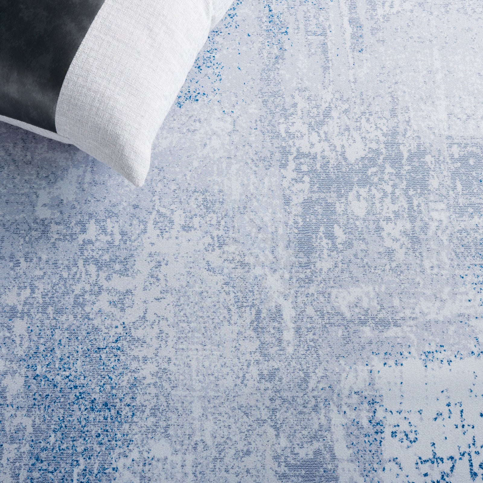 Soft gray and blue texture pairs beautifully with pillows and modern decor || TAC814F-5 || detail_room