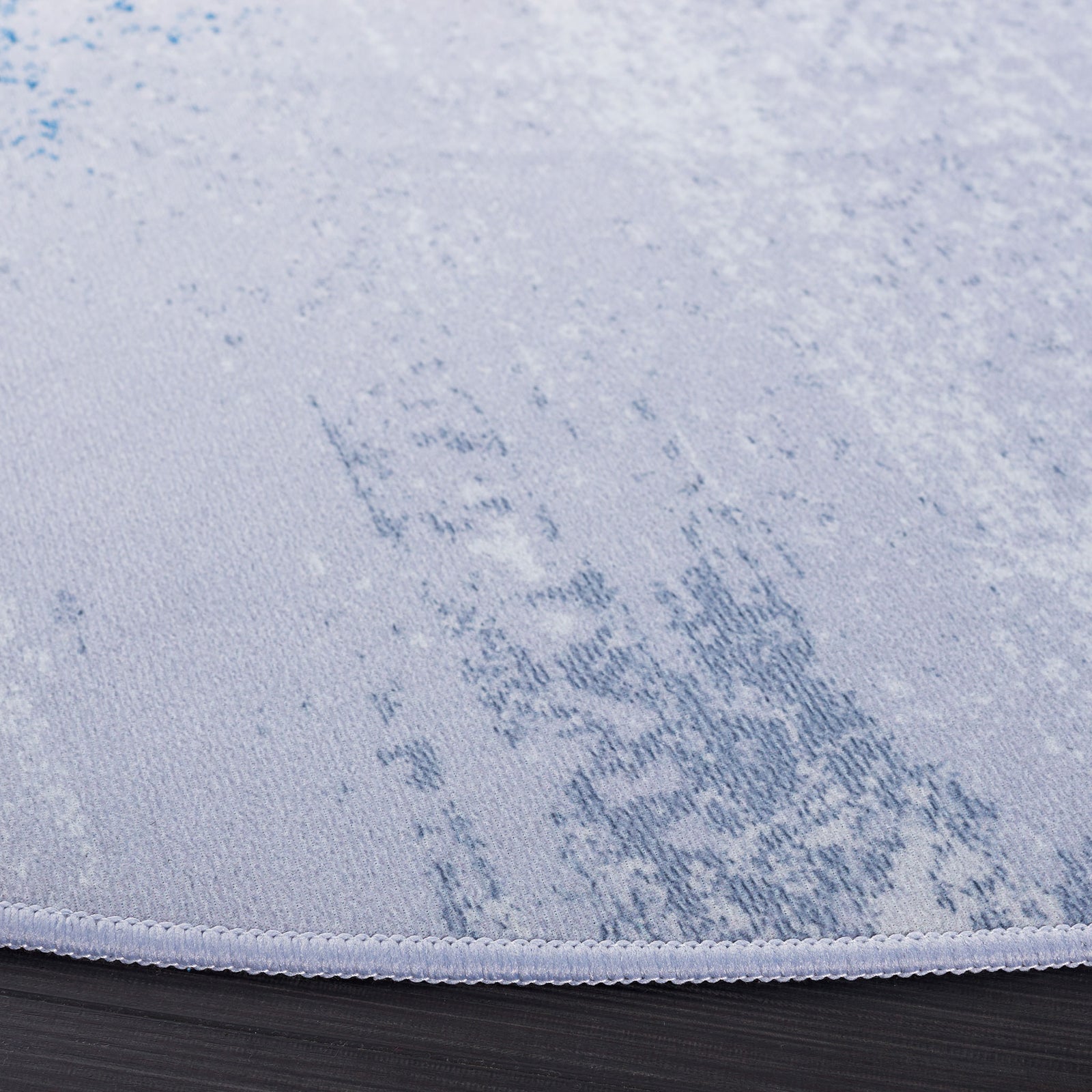 Soft low-pile texture and neatly stitched edge in gray and blue || TAC814F-6R || detail_studio