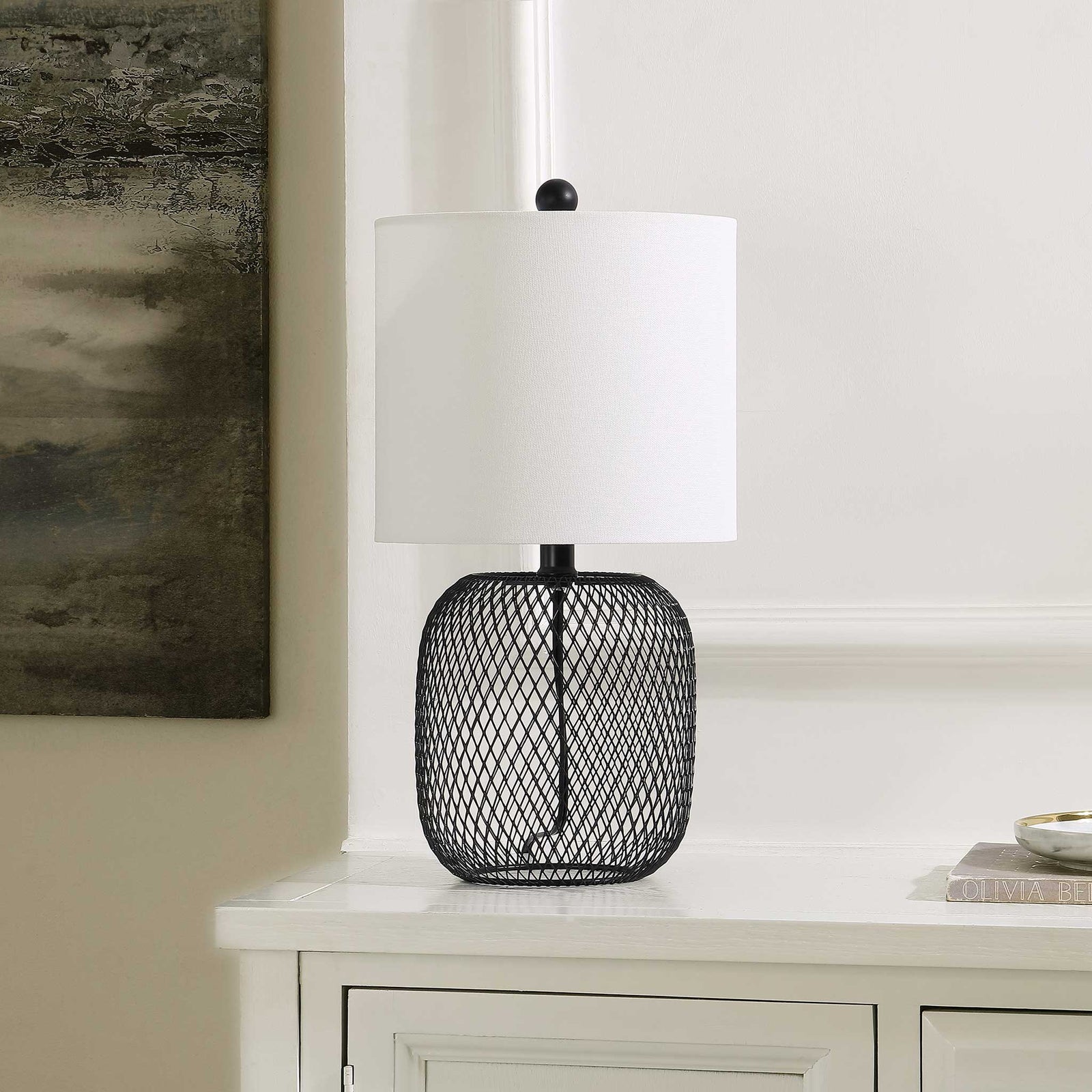 Sleek black wirework base and white shade complement transitional decor on a console or nightstand. || TBL4470A || front_angle_room