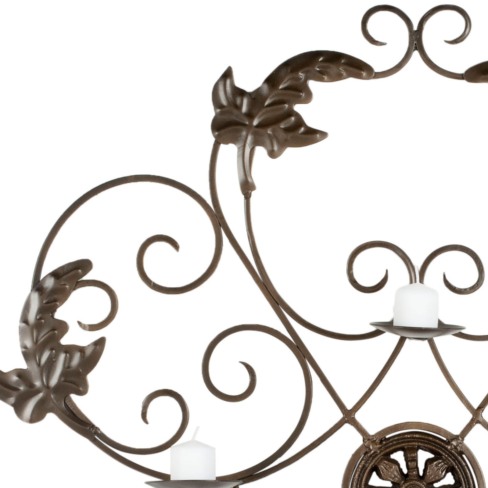Sculpted leaves and looping iron scrolls surround slender candleholders. || WDC1006A || detail_studio