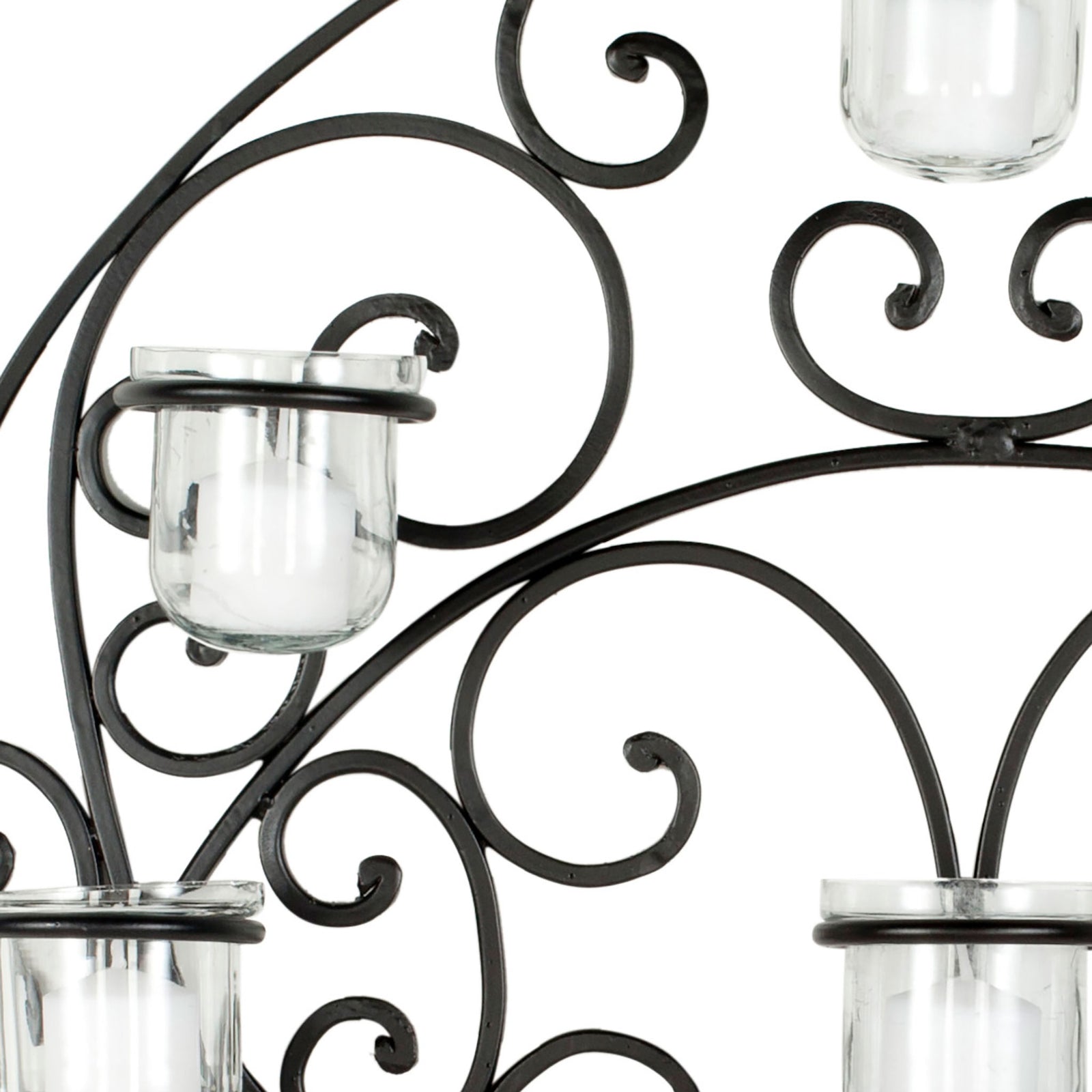 Curving black iron scrollwork frames clear glass votive holders || WDC1010A || detail_studio