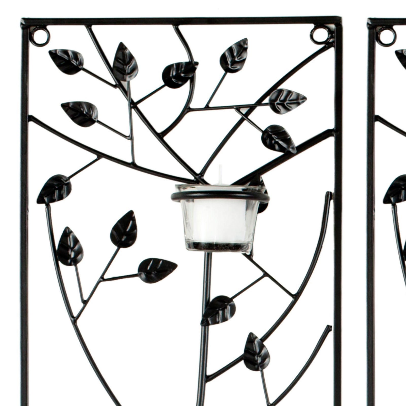 Sculpted black iron leaves surround a glass votive cup for delicate botanical texture || WDC1013A || detail_studio