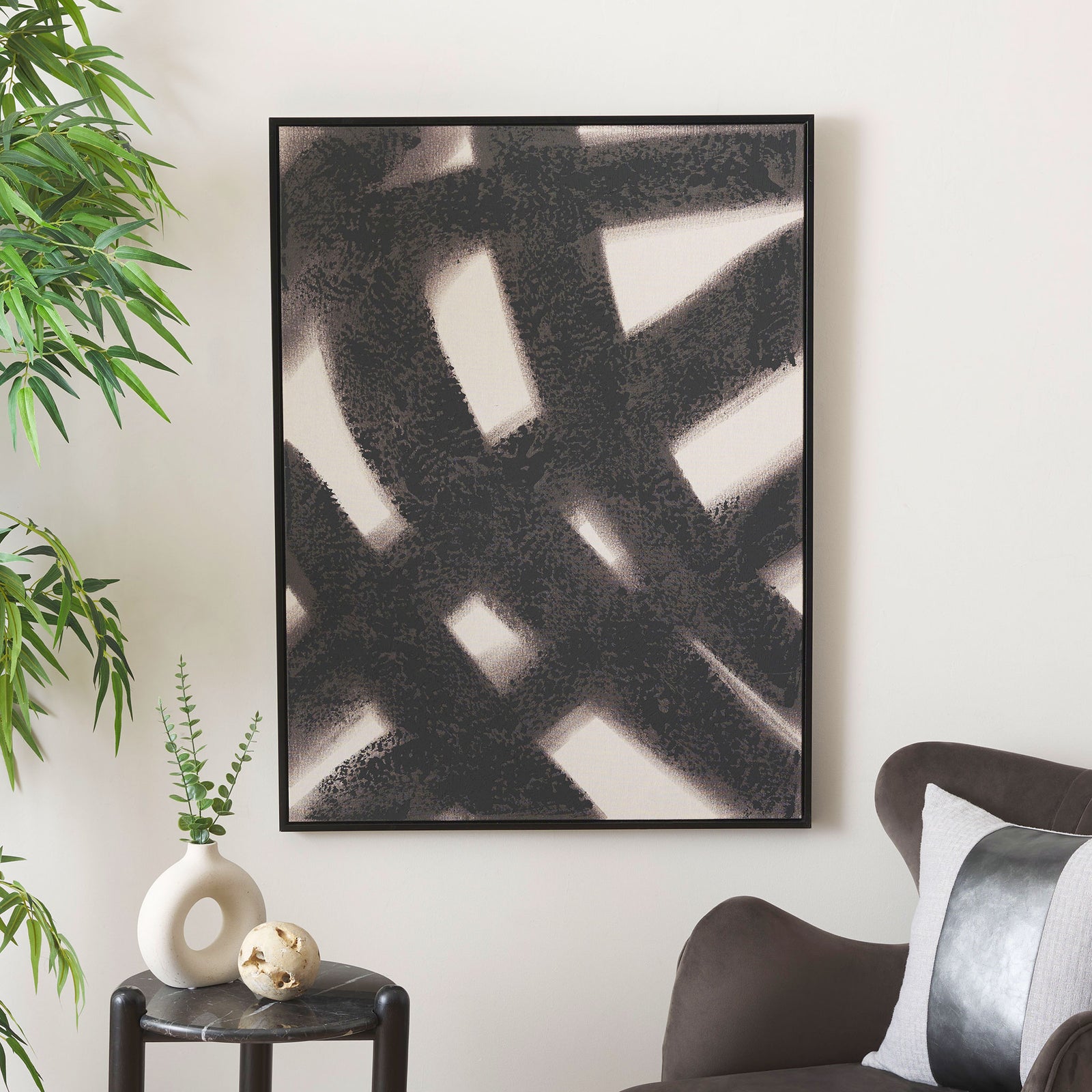 Bold black brushstrokes bring graphic contrast to a neutral living space || WLA2076A || front_room