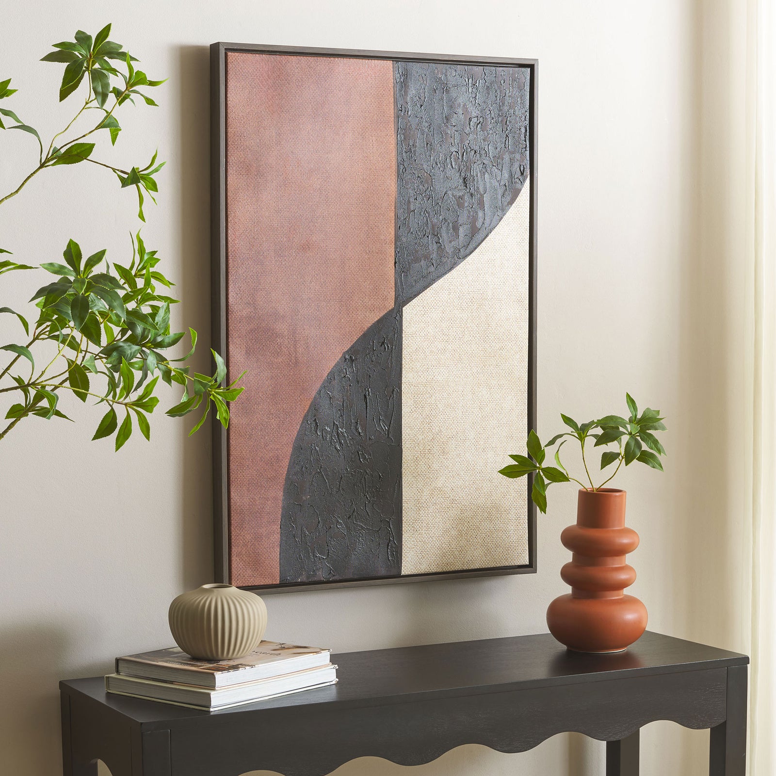 Burnt orange, black, and ivory canvas art adds warmth and contrast to a neutral interior. || WLA3030A || front_angle_room