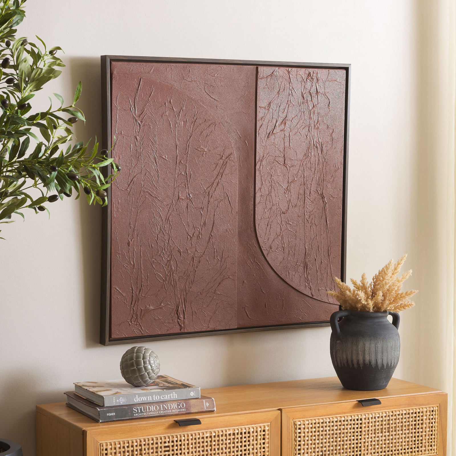 Sculptural maroon canvas art adds warmth and texture above a light wood cabinet || WLA3033A || front_angle_room