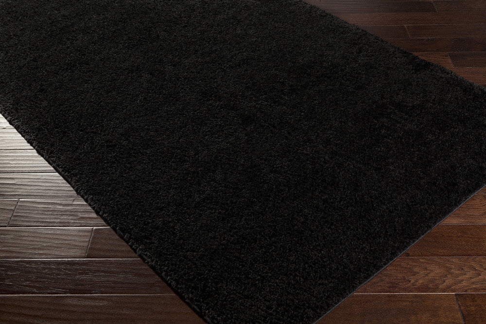 Arlie Black Area Rug
