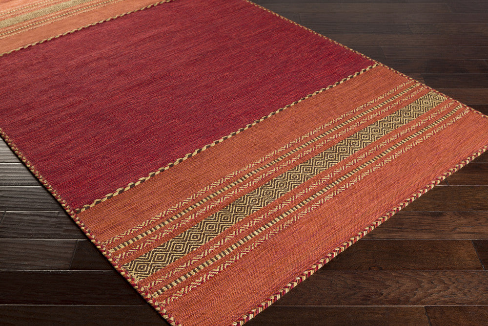 Trenza Cherry/Chocolate Area Rug