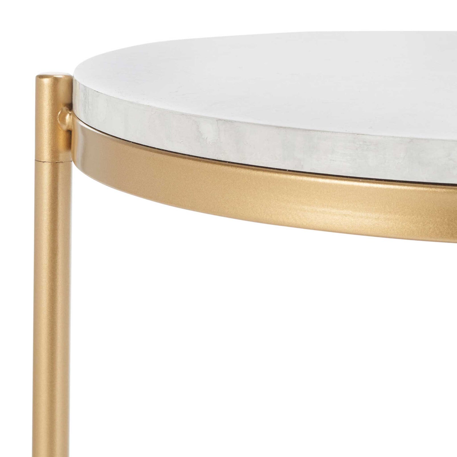 Polished gold rim encircles the faux marble shelf, highlighting its smooth edge and craftsmanship. || ACC2501A || detail_studio