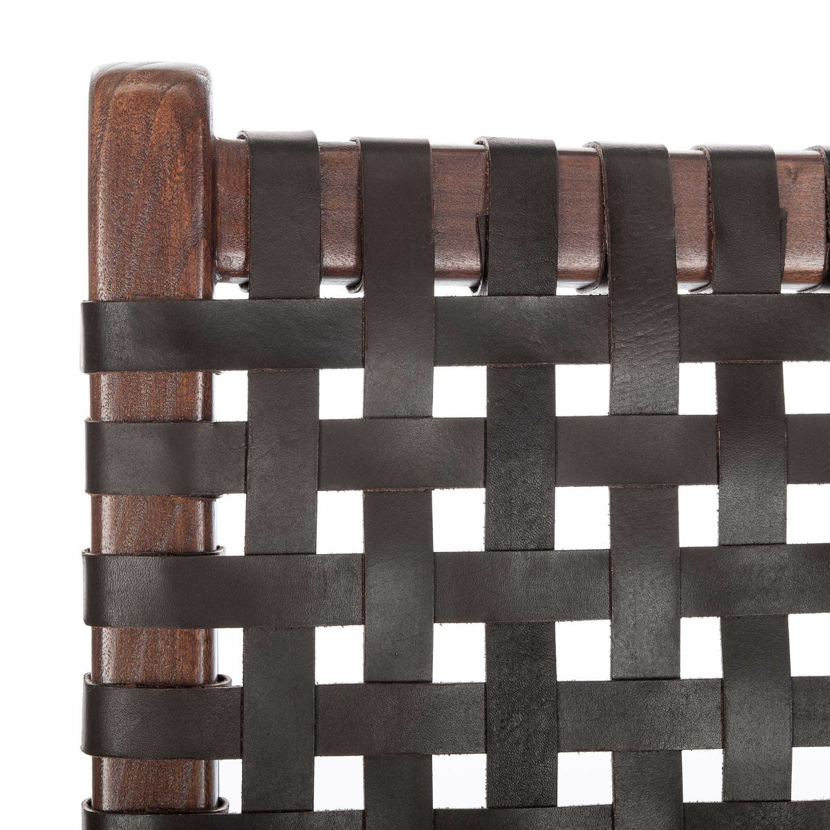 At the edge of the backrest, dark leather bands interlace around the brown wood frame.
