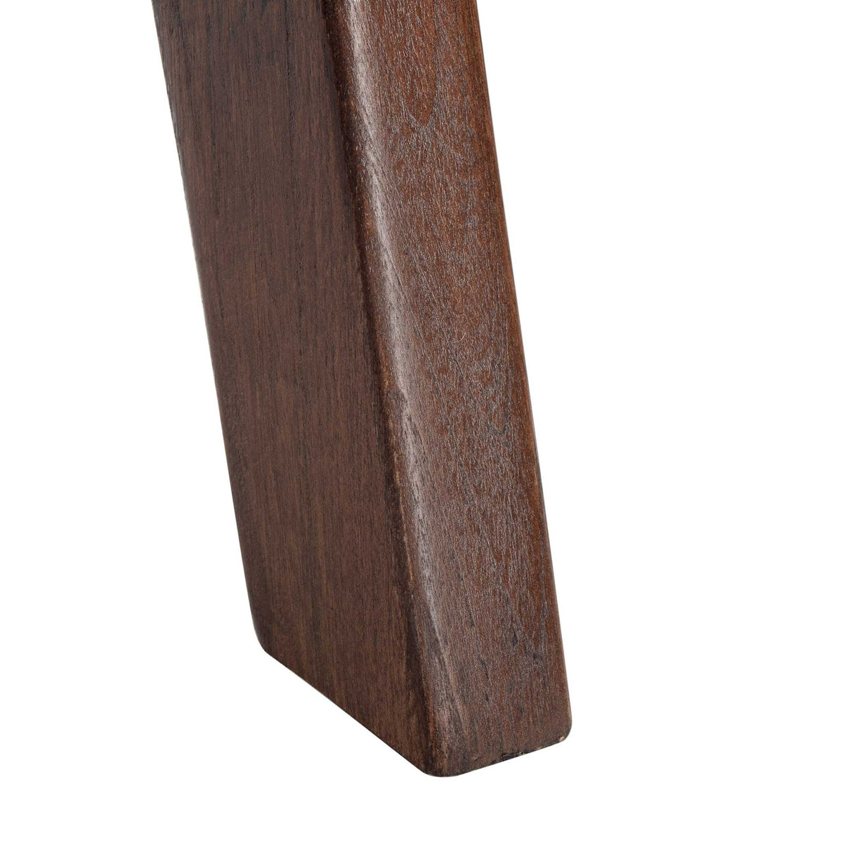 Rich brown wood grain lends natural depth to a softly rounded, tapered chair leg.