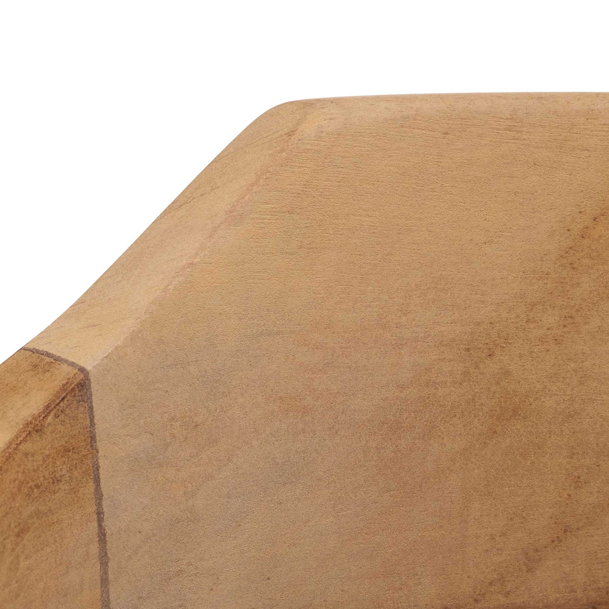 Subtle tonal grain lends organic character to the chair's smooth teak backrest