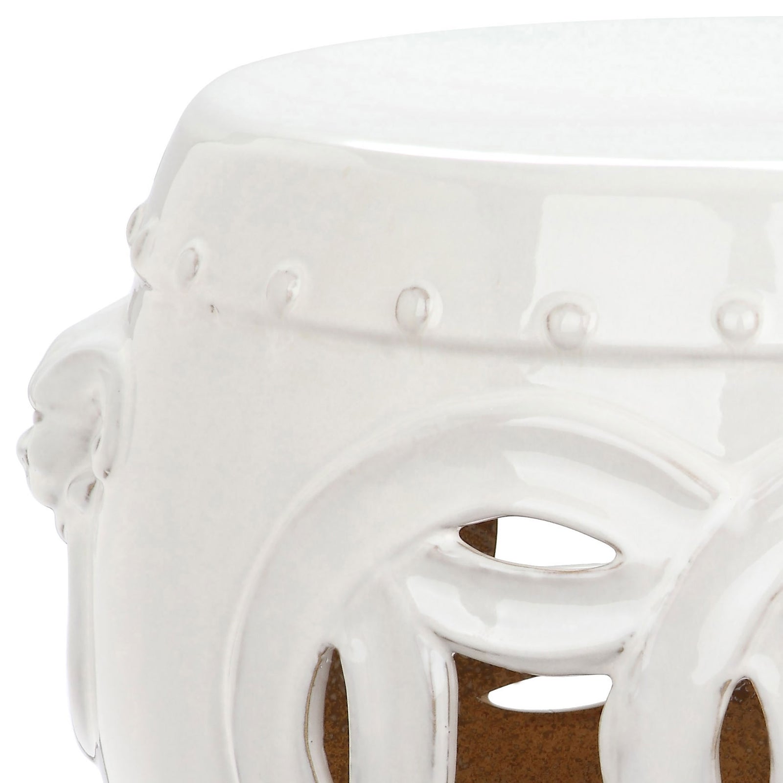 Smooth antique white glaze finishes the raised beaded trim and layered openwork coin details. || ACS4534A || detail_studio
