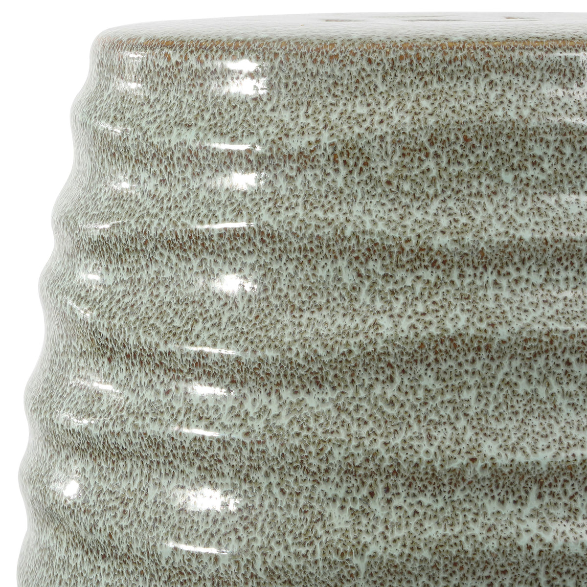 Light blue-gray glaze and fine brown speckling accent the stool's sculpted horizontal ridges. || ACS4575B || detail_studio
