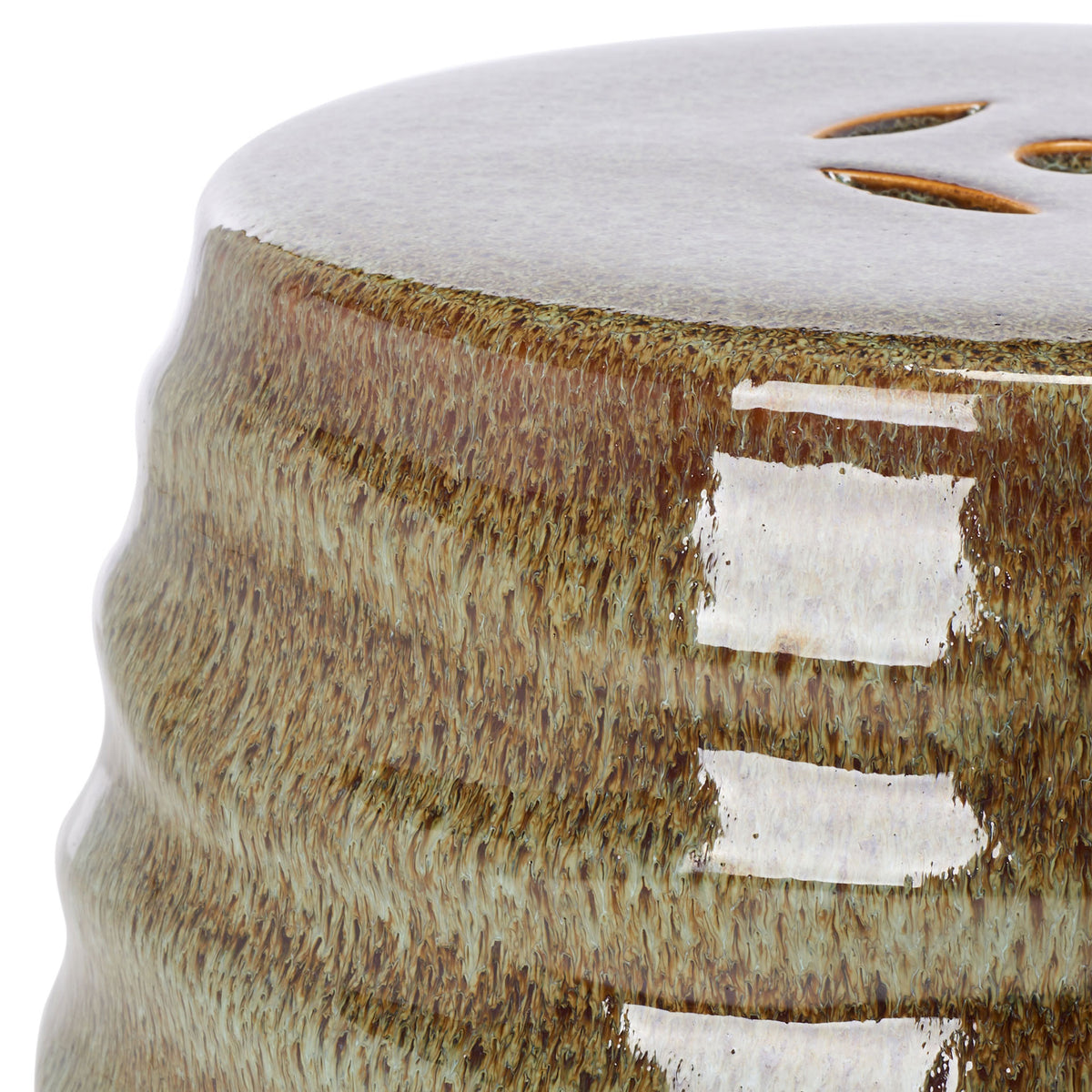 A pale vented seat meets richly mottled brown glaze along the stool's wavy ceramic rim. || ACS4575B || detail_studio