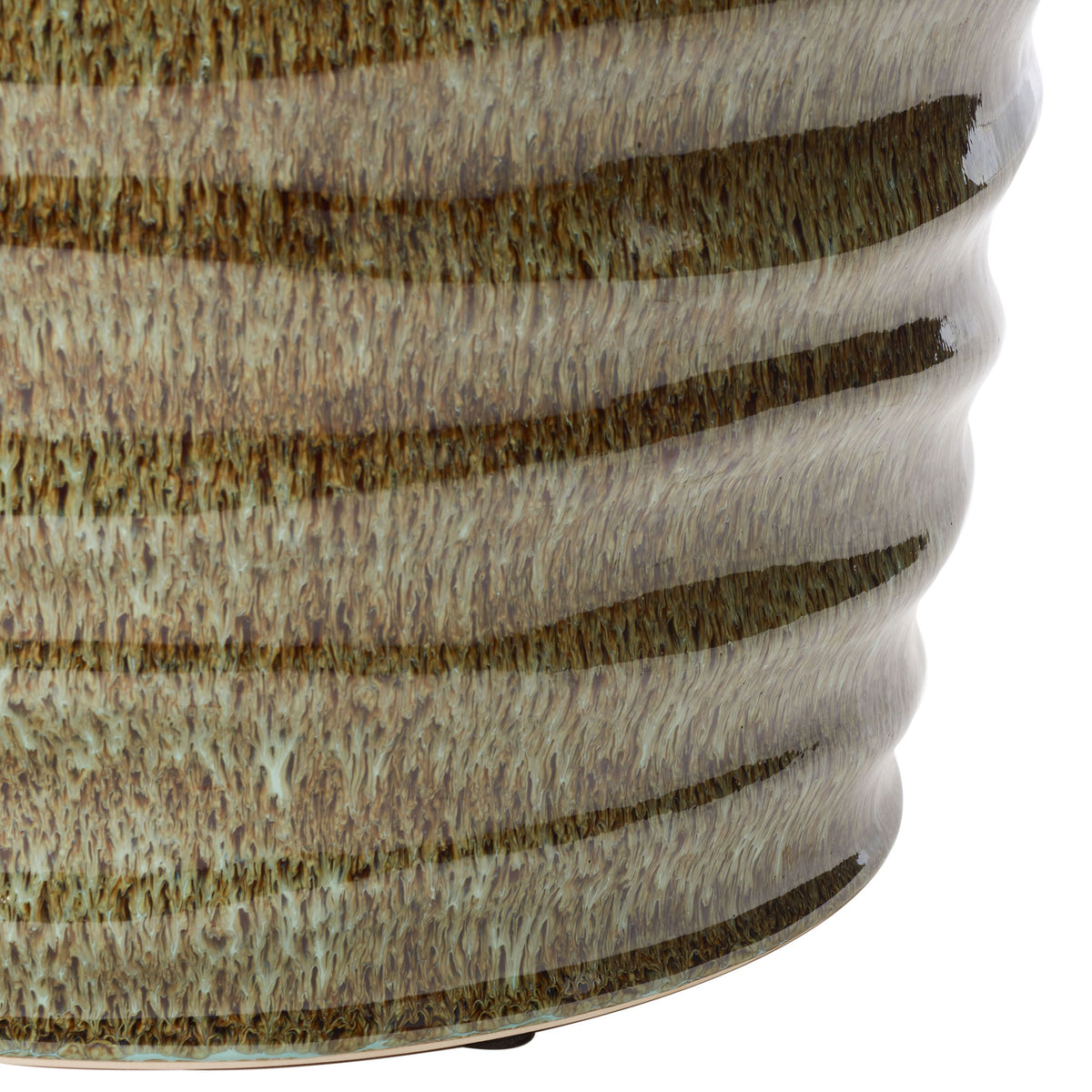 Warm brown and cream glaze flows across rippled ceramic sides to the stool's sturdy base. || ACS4575B || leg_studio