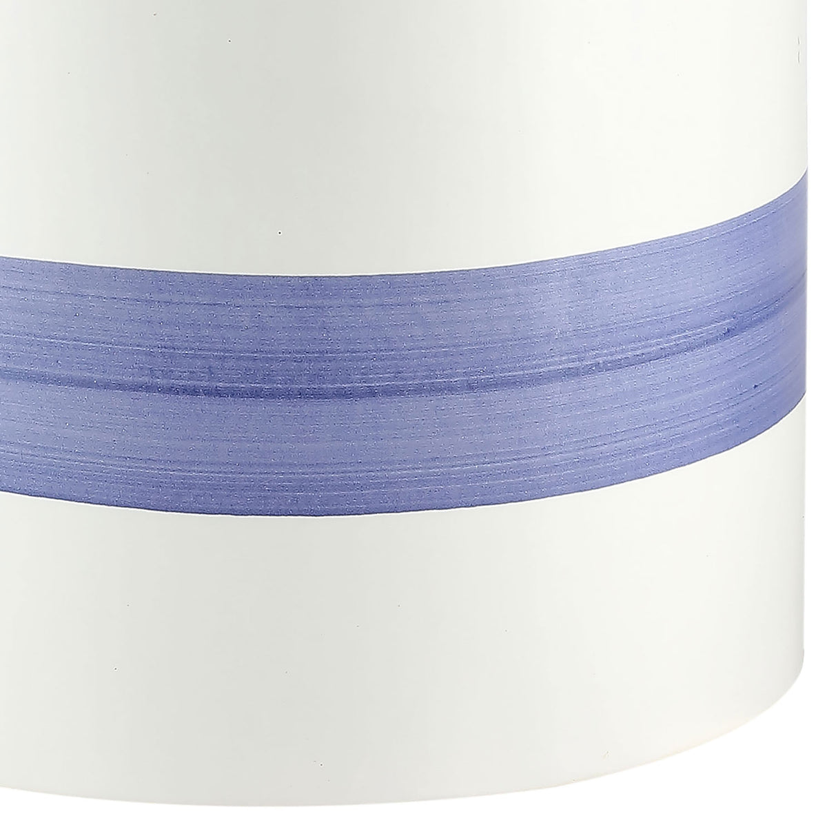 Brushstroke-like blue glaze forms an artful stripe across smooth white ceramic. || ACS4584A || detail_studio