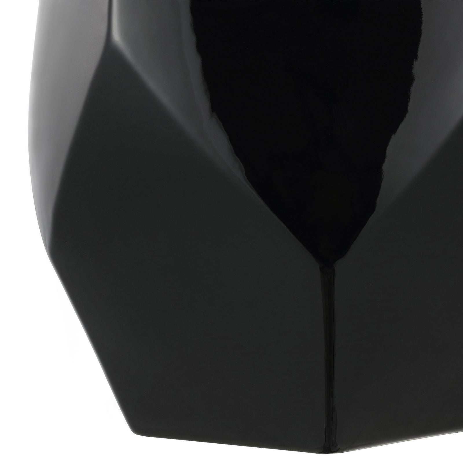 Angular lower facets taper to a compact base in rich black ceramic || ACS4596B || leg_studio
