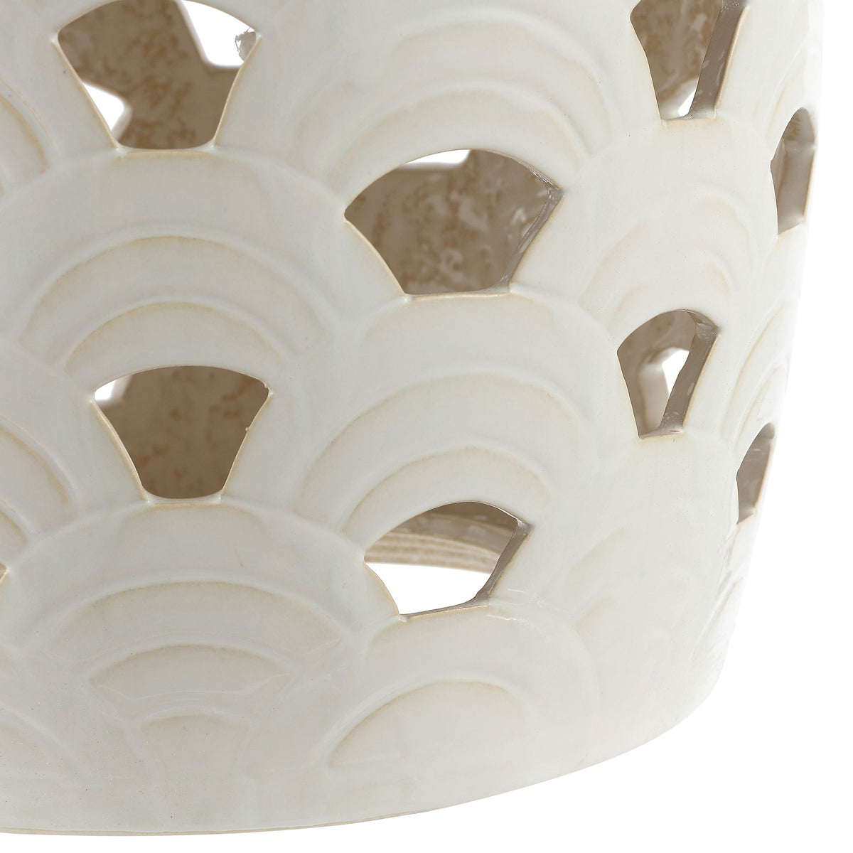 Layered arches and openwork continue around the cream ceramic base. || ACS4597A || detail_studio