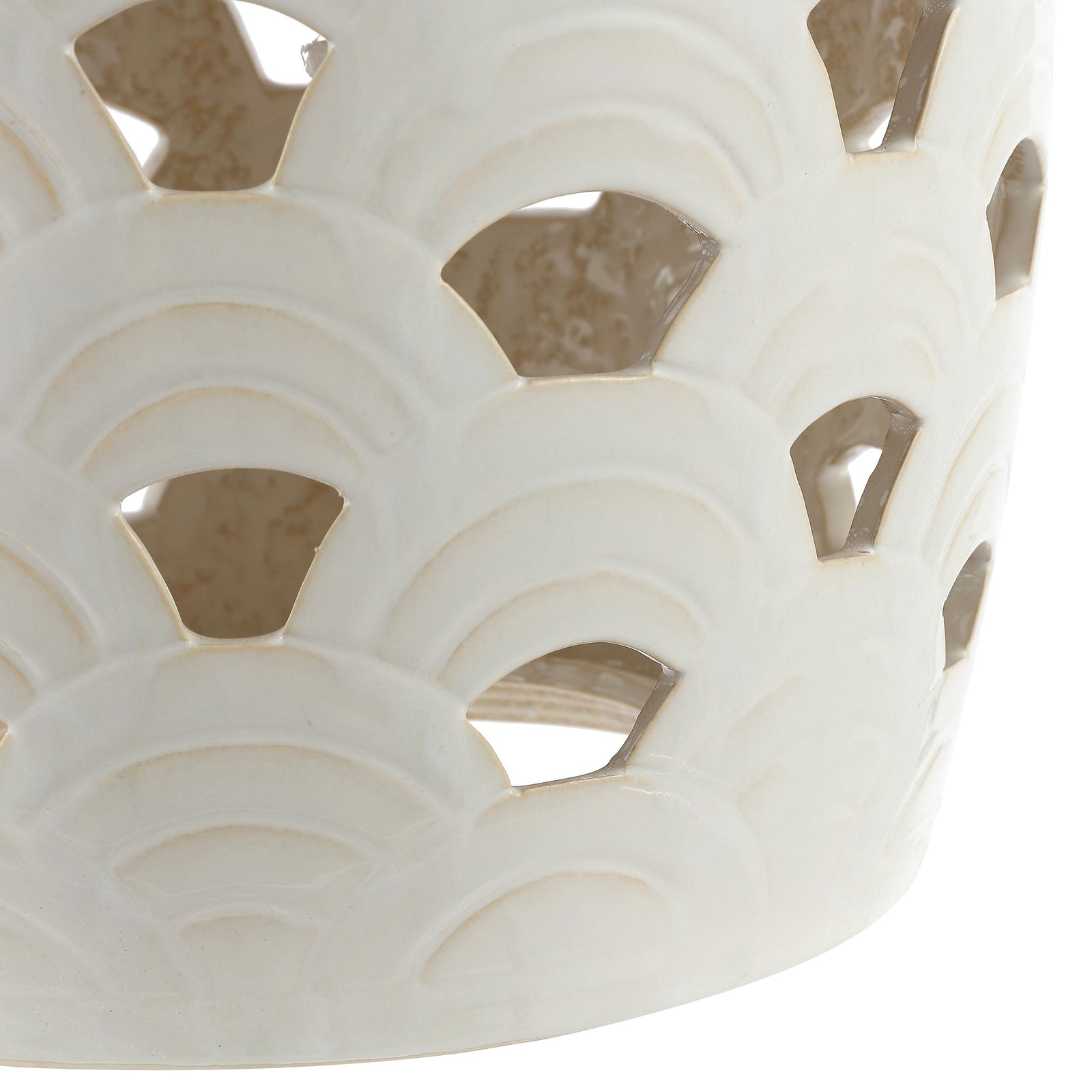 Layered arches and openwork continue around the cream ceramic base. || ACS4597A || detail_studio