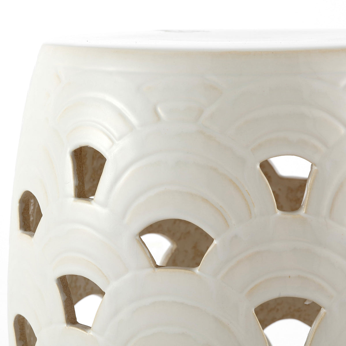 Cream ceramic features sculpted arches and airy cutouts. || ACS4597A || detail_studio