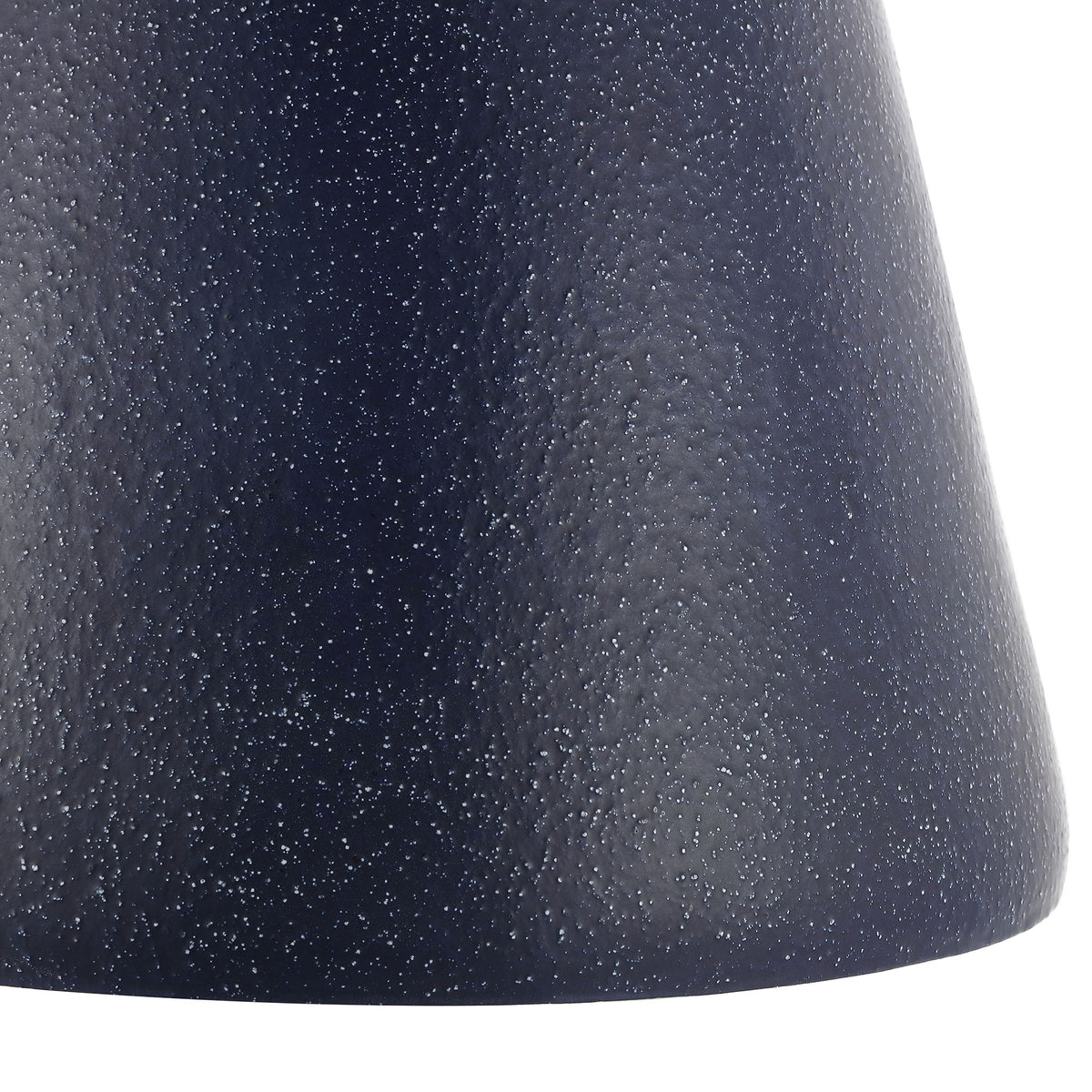 Navy ceramic pedestal widens at the base, revealing its fine speckled finish