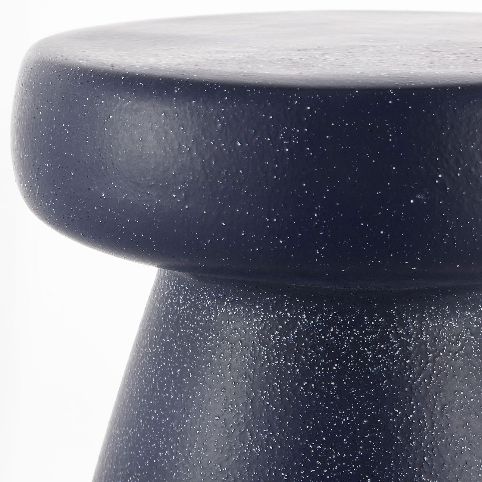 Rounded navy top and narrow waist display the ceramic stool's scattered speckles || ACS4603A || detail_studio