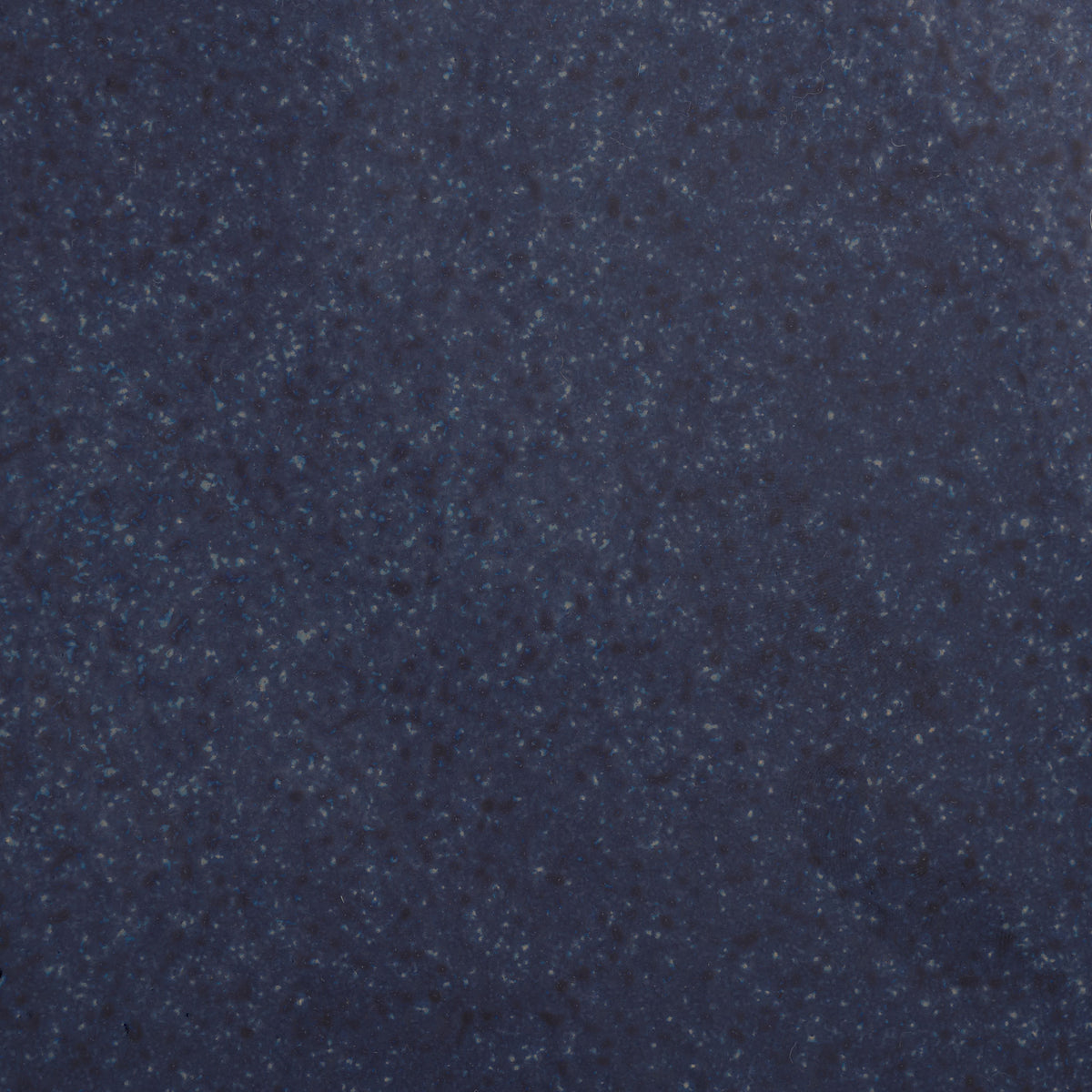 Fine flecks of navy and cobalt add depth to the glazed blue ceramic finish. || ACS4611B || swatch_studio