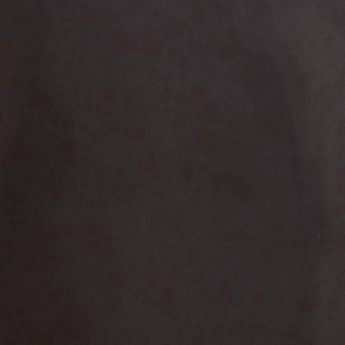 Dark brown ceramic glaze reveals subtle reddish mottling and tonal variation. || ACS4613A || swatch_studio
