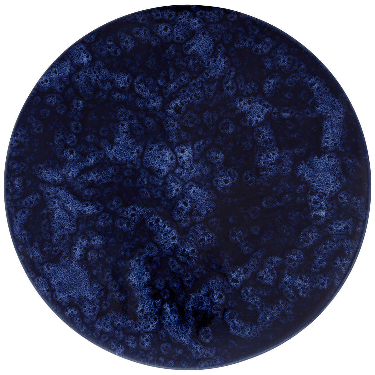 A circular ceramic top displays swirling, speckled variations in its dark blue glaze || ACS4615A || top_studio